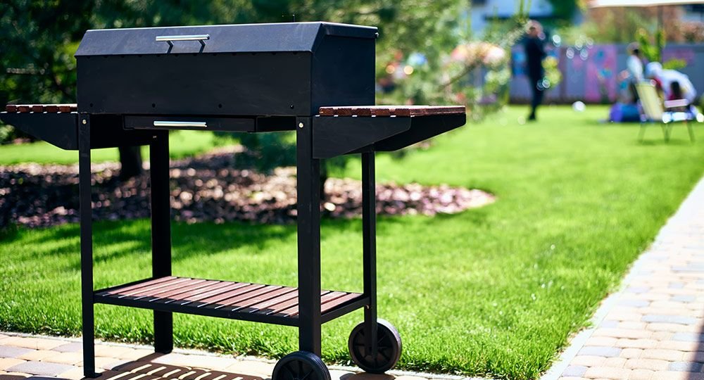 barbecue-grill-wheels-with-wooden-stands-garden