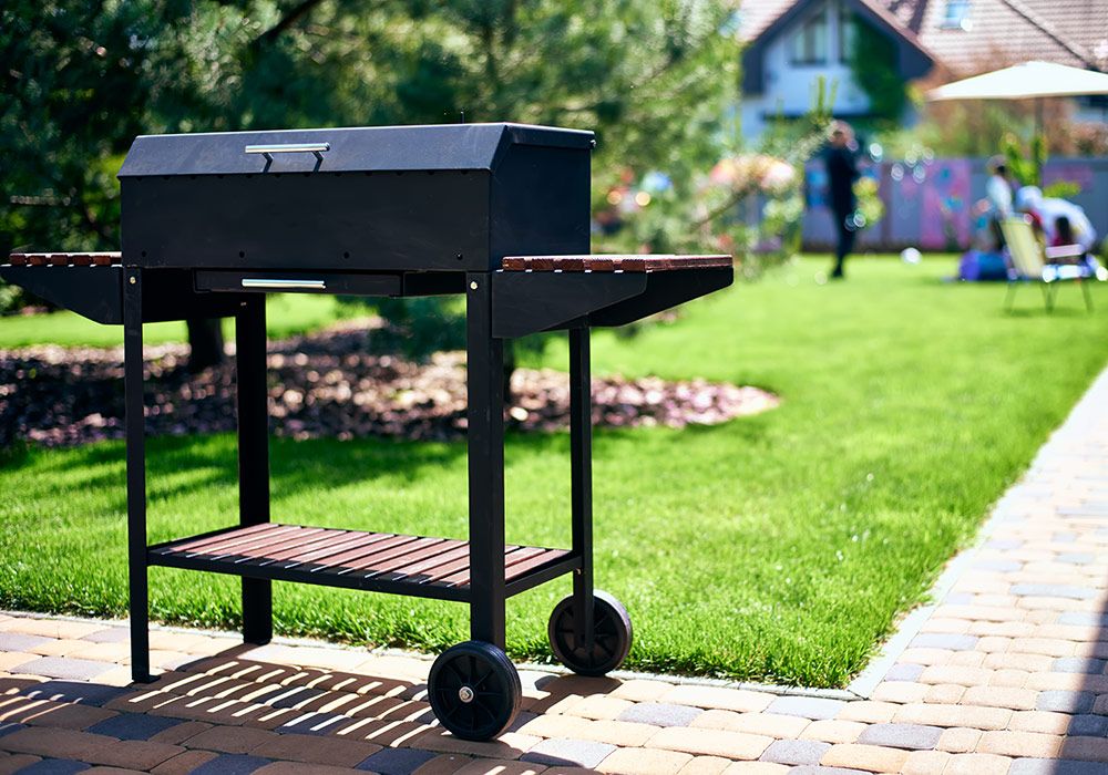 barbecue-grill-wheels-with-wooden-stands-garden