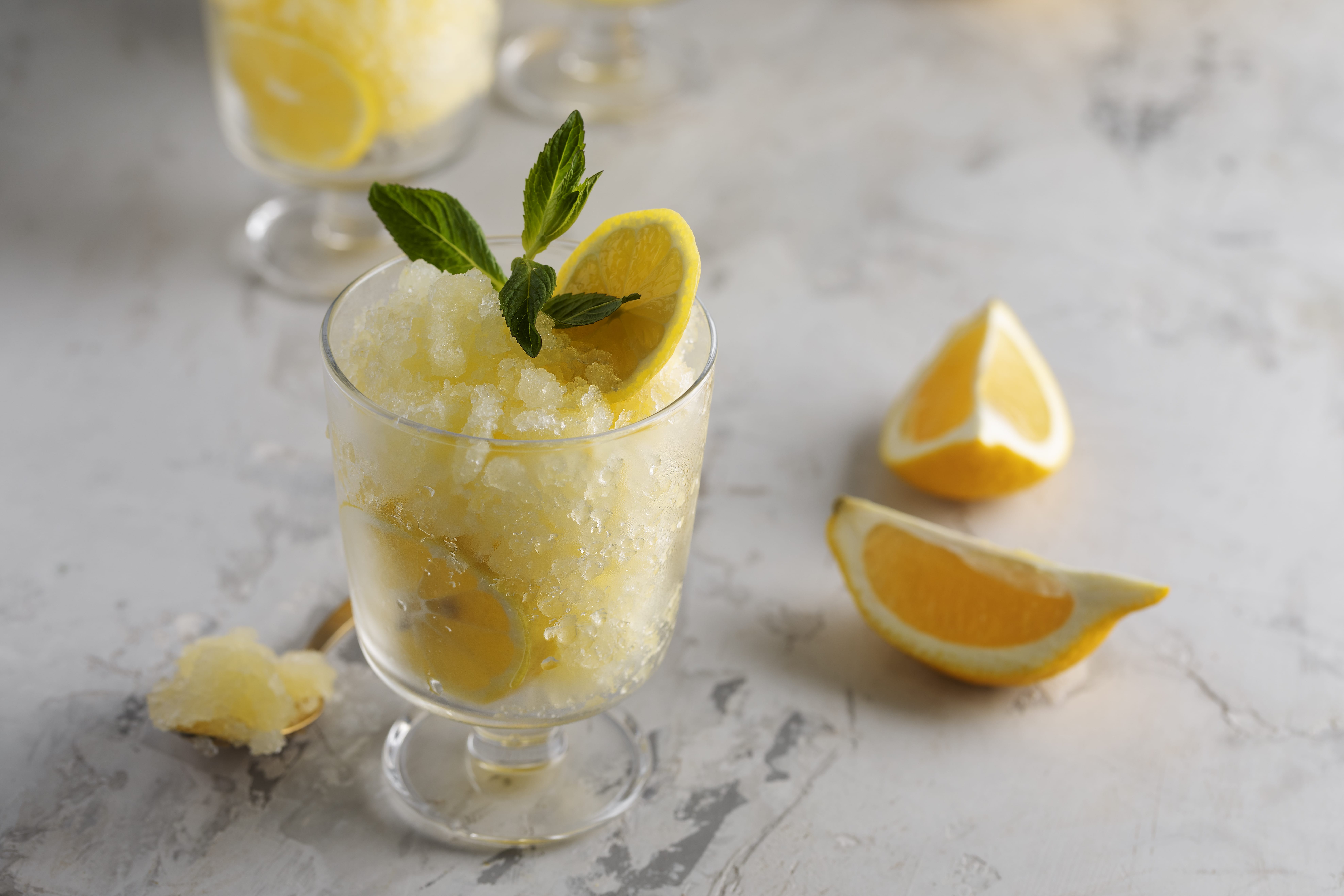 tasty-granita-dessert-with-lemon-high-angle-min