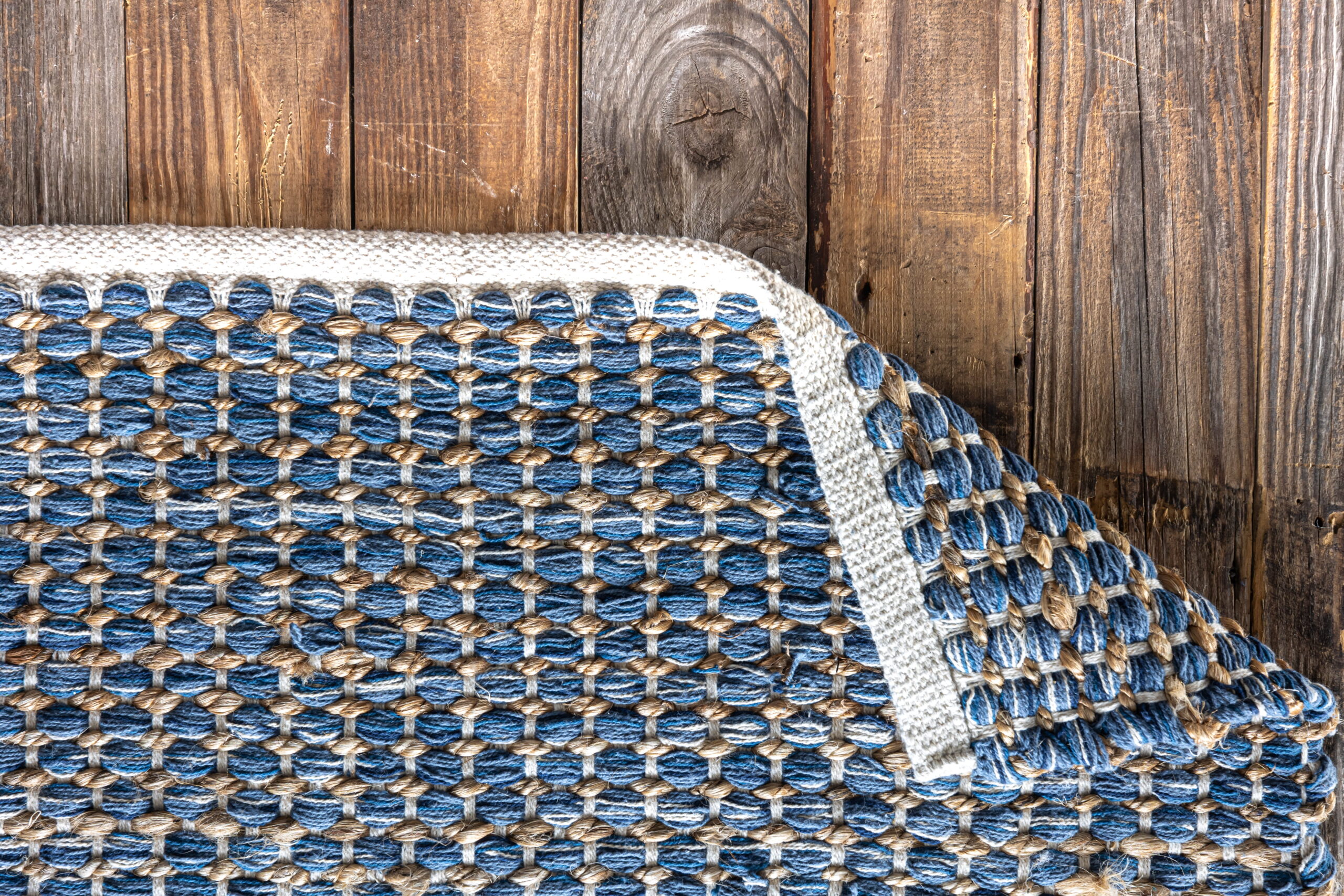 hand-woven-geometric-denim-area-rug-wooden-floor (1)