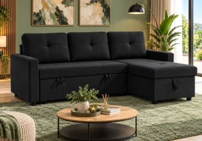 Salon d'angle convertible BIREO en tissu noir, méridienne à droite, dans un salon lumineux